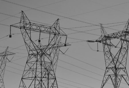 Upward view of electricity pylons